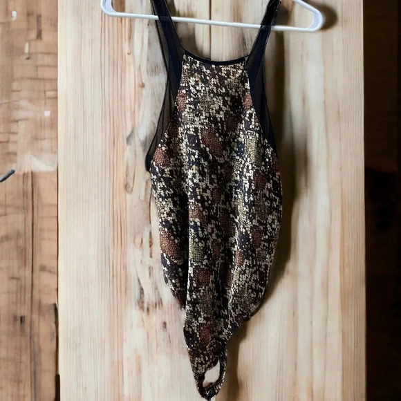 Free People Intimately Snakeskin bodysuit with lace trim. NWOT’s.  Size S/P - Picture 1 of 6